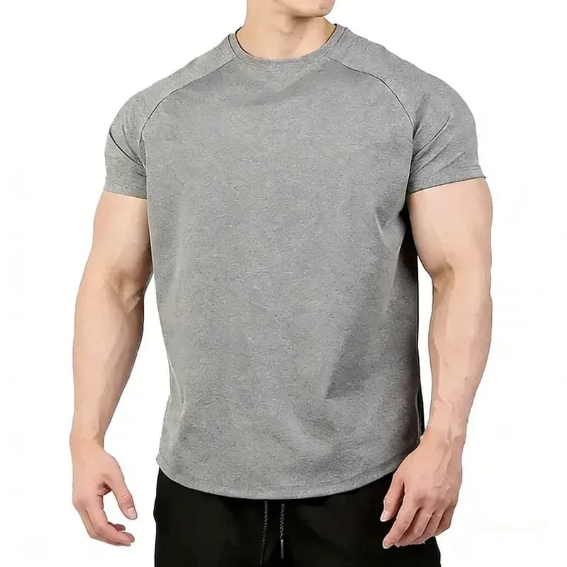 man wearing a grey athletic fit gym t-shirt