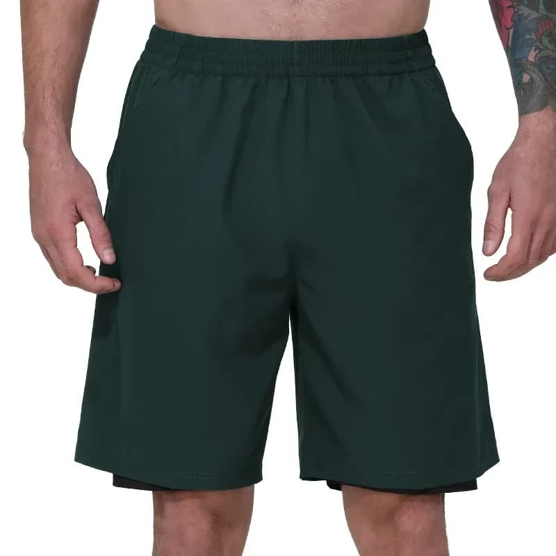 man wearing dark green 2 in 1 gym shorts