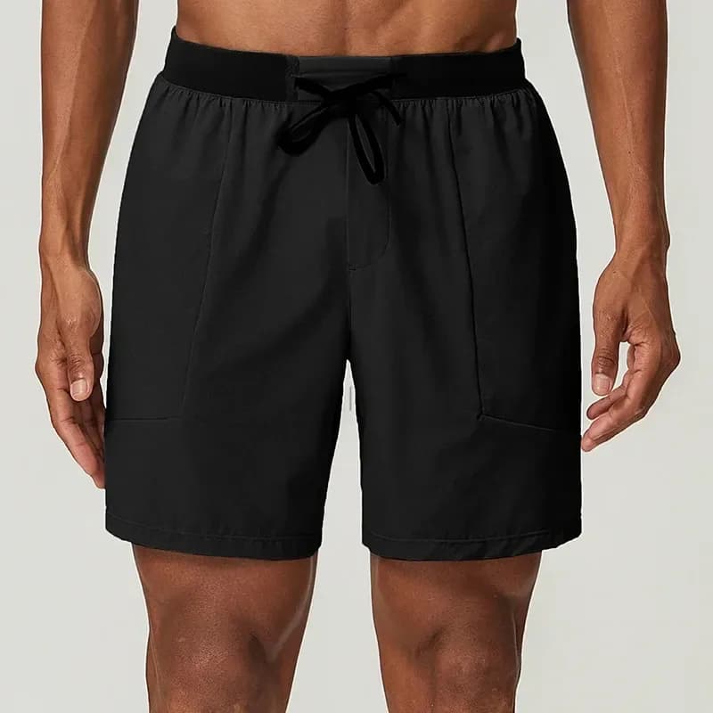 man wearing black stretch training shorts