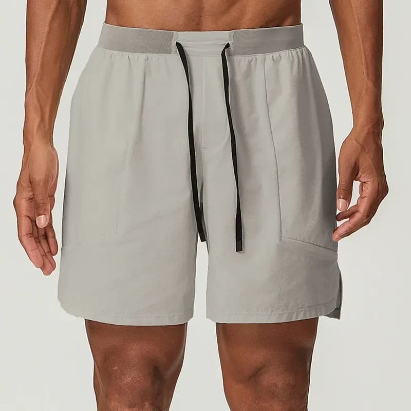 man wearing cool grey stretch training shorts