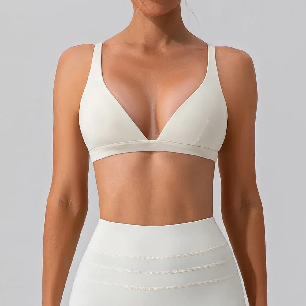 beige deep V neck sports bra with matching leggings
