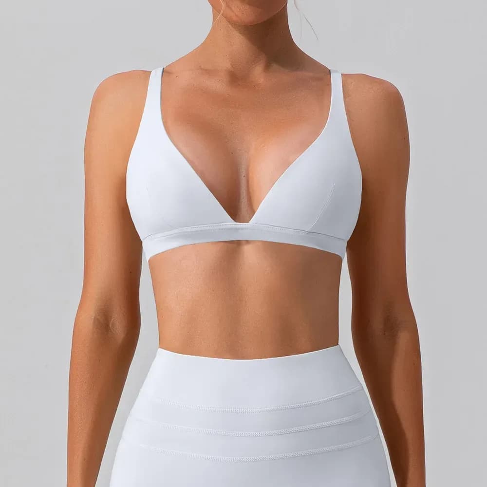 white deep V neck sports bra with light support