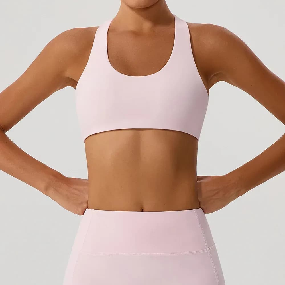 pink cross back sports bra with matching leggings
