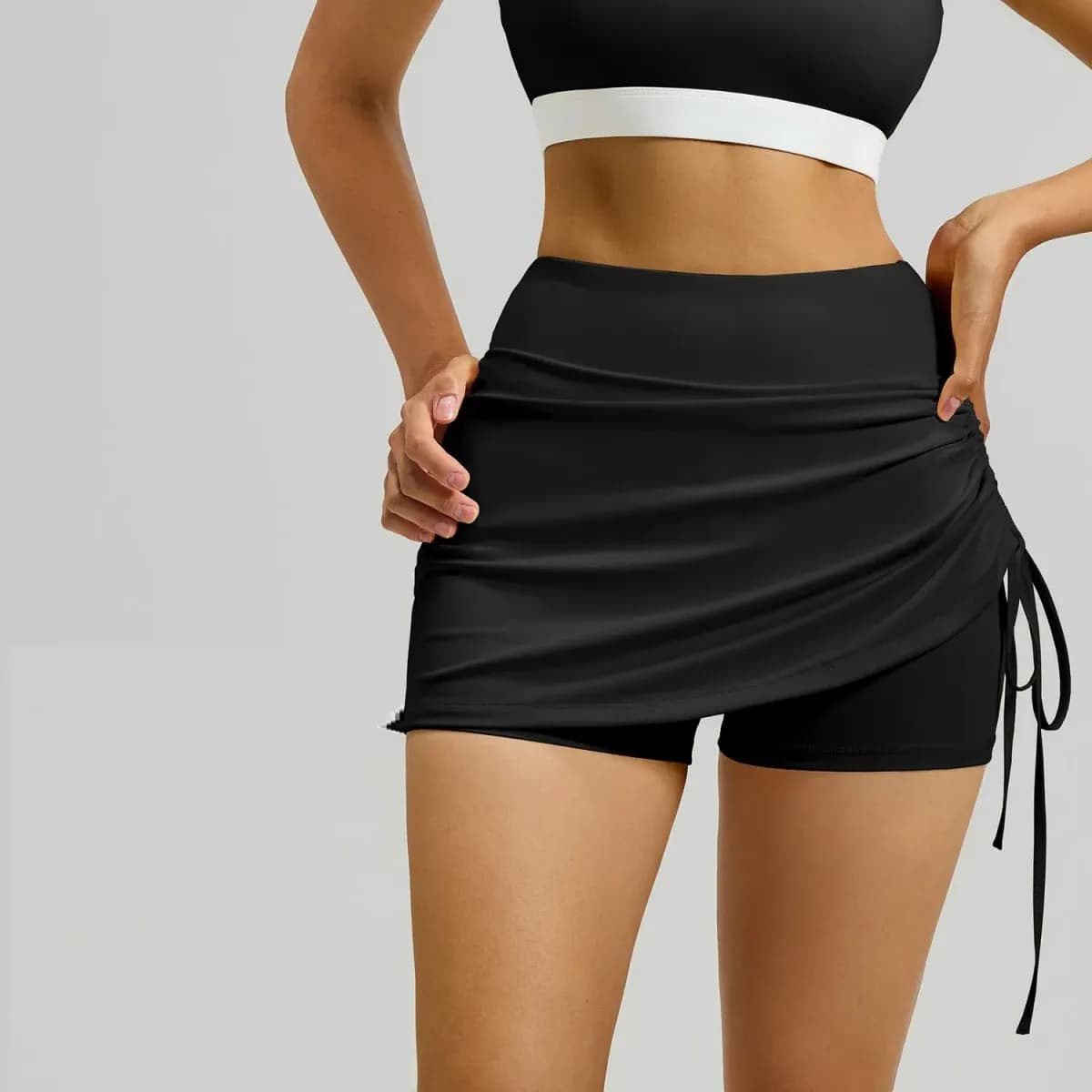 black ruched high waisted skort with built in shorts