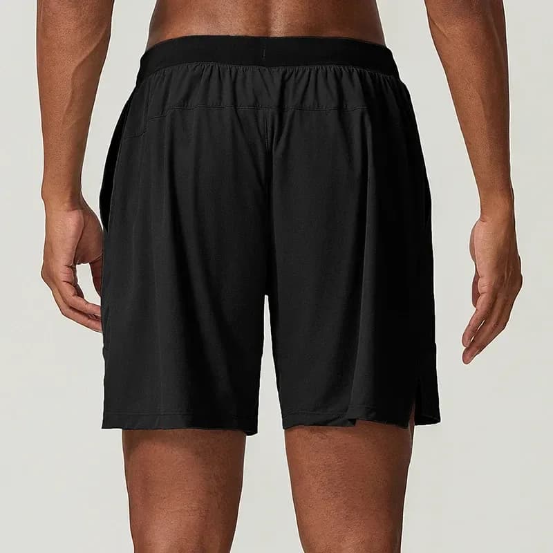 black stretch training shorts for men with side split hem