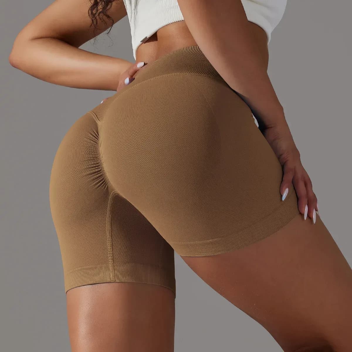 caramel seamless scrunch butt gym shorts, back view showing the ruching