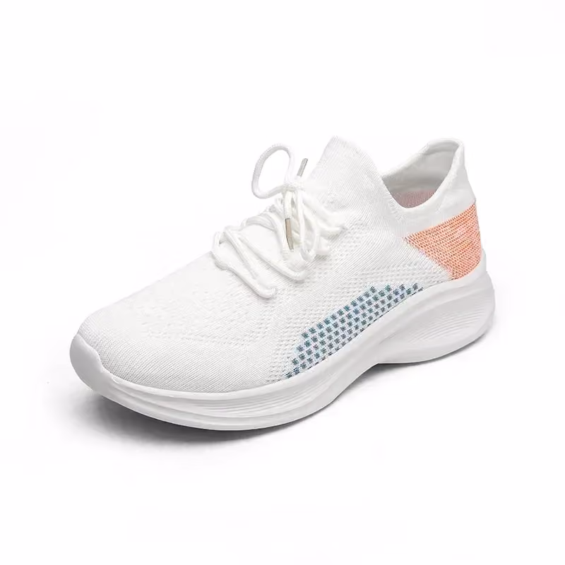 white lightweight knit running shoe with coral and blue accents, side view