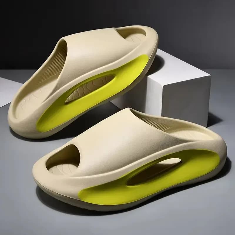 pair of sand and lime thick platform eva slides with cutout sole